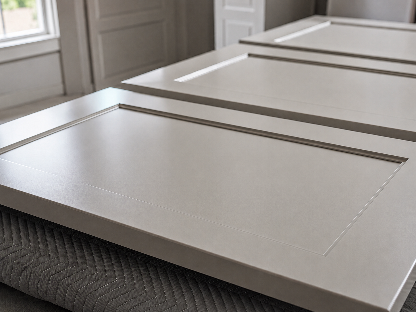 Smooth spray finish applied to cabinet surfaces in Connecticut