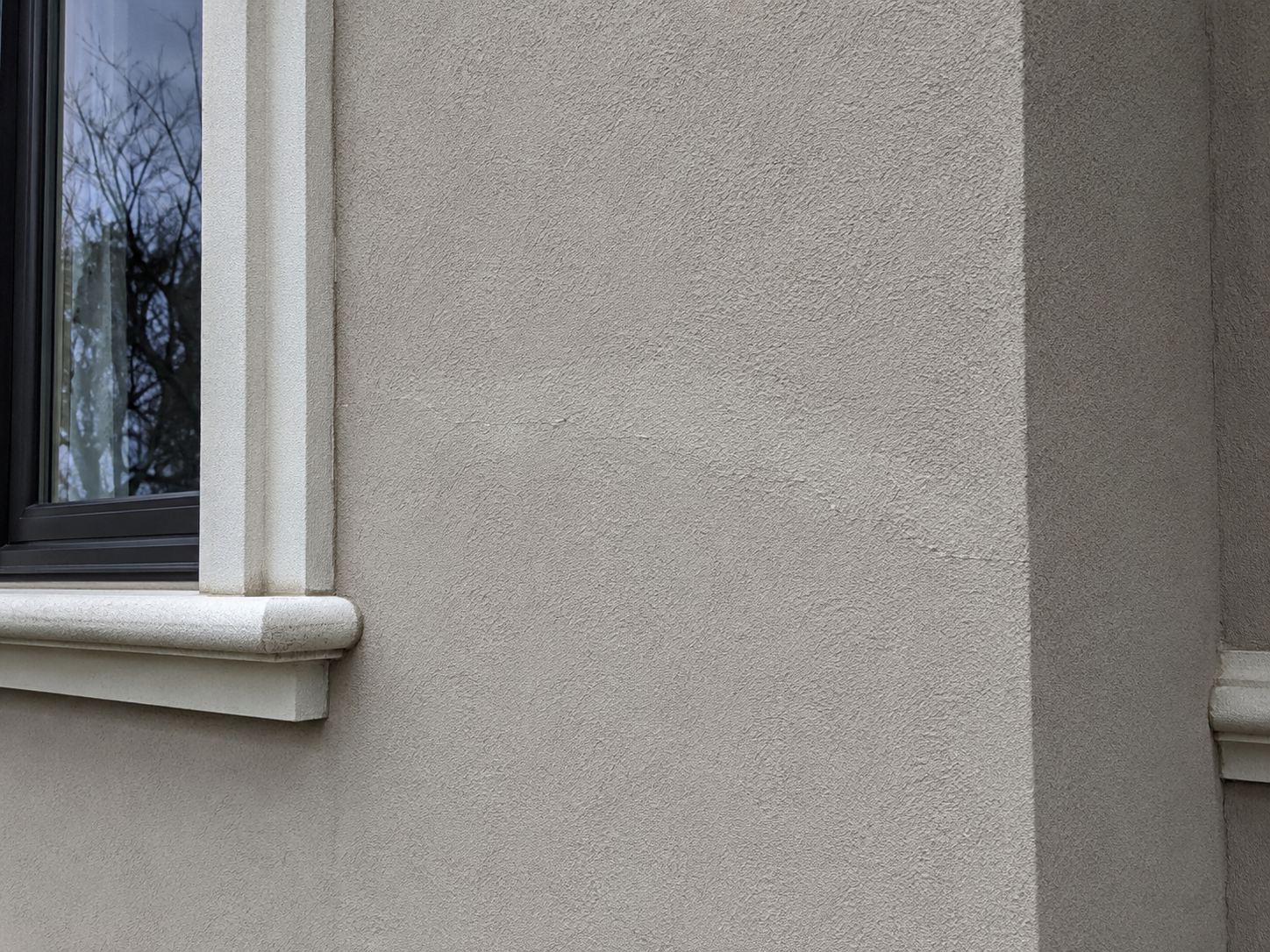 Stucco crack repair before painting in Connecticut