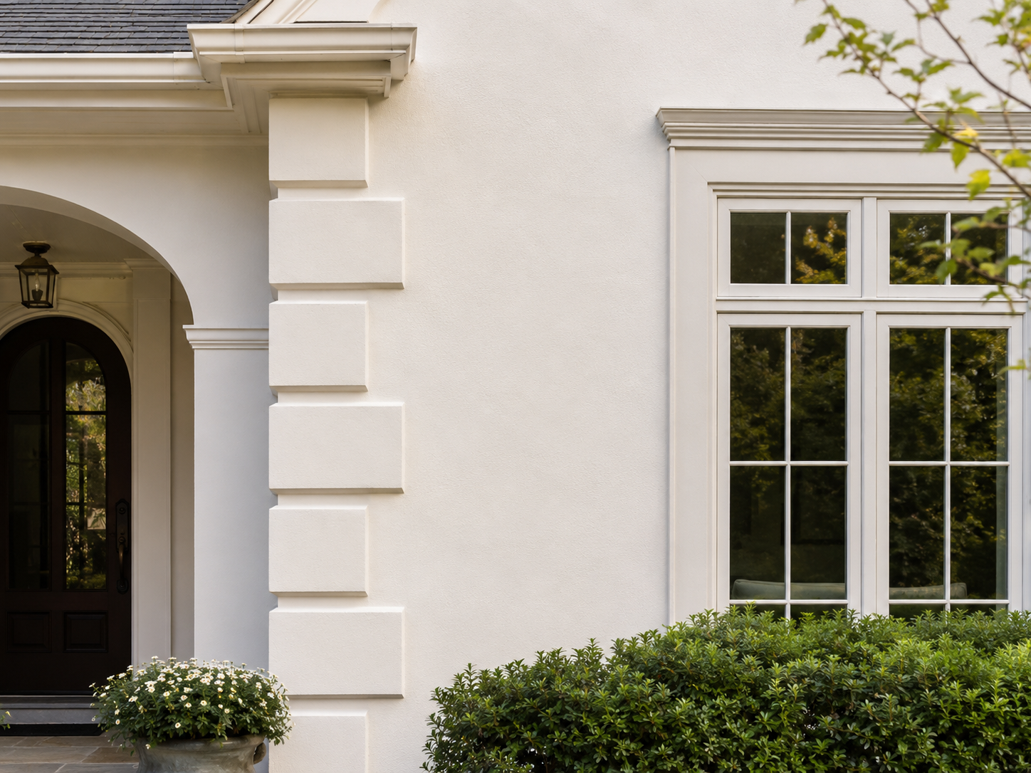 Stucco painting on a Connecticut home exterior